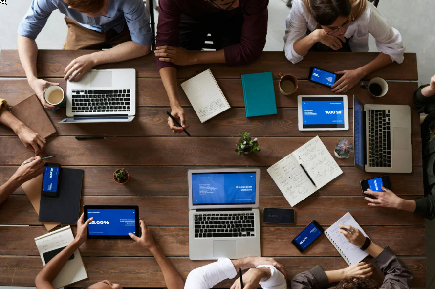 Quad-B Systems team collaborating on digital transformation solutions
